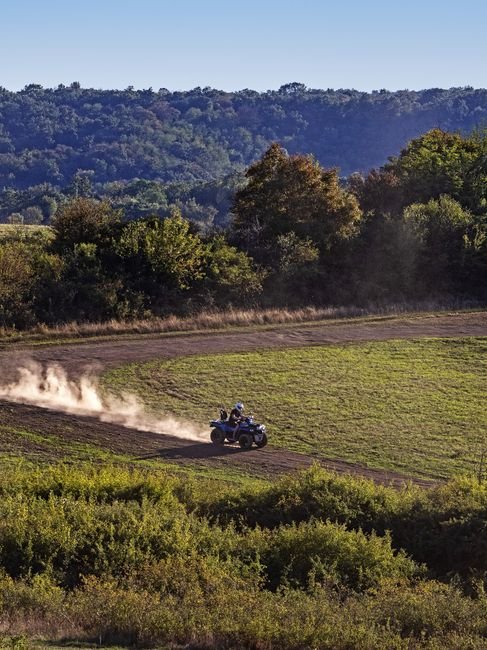 ATV riding along a rural trail near Algona Iowa