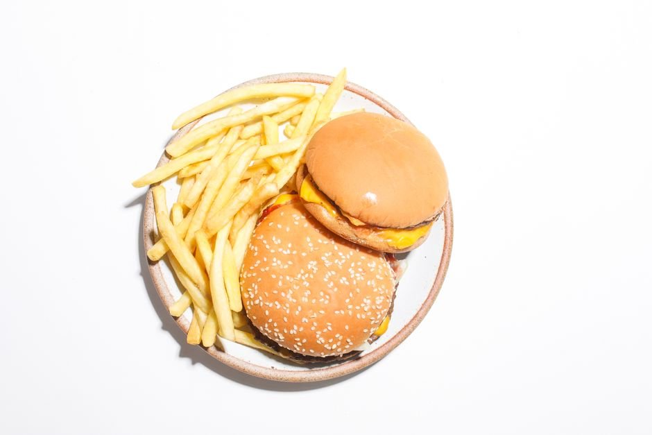Cheeseburgers and french fries on a plate