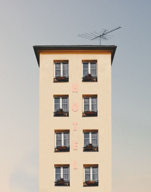 Generic hotel building exterior representing lodging options near Algona Iowa