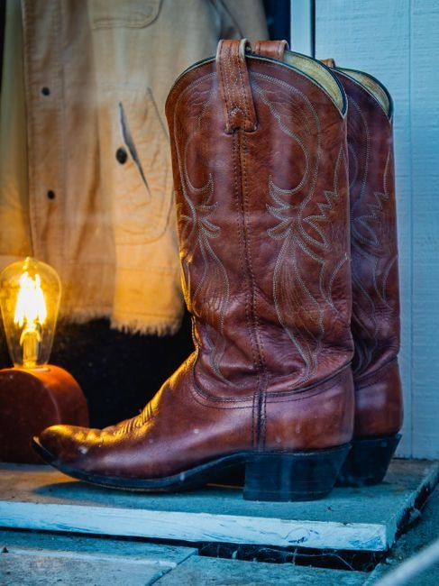 Pair of leather work boots, the kind of workwear footwear sold at Bomgaars in Algona, Iowa