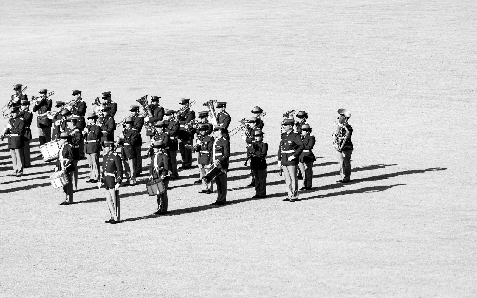 High school marching band performing on a field