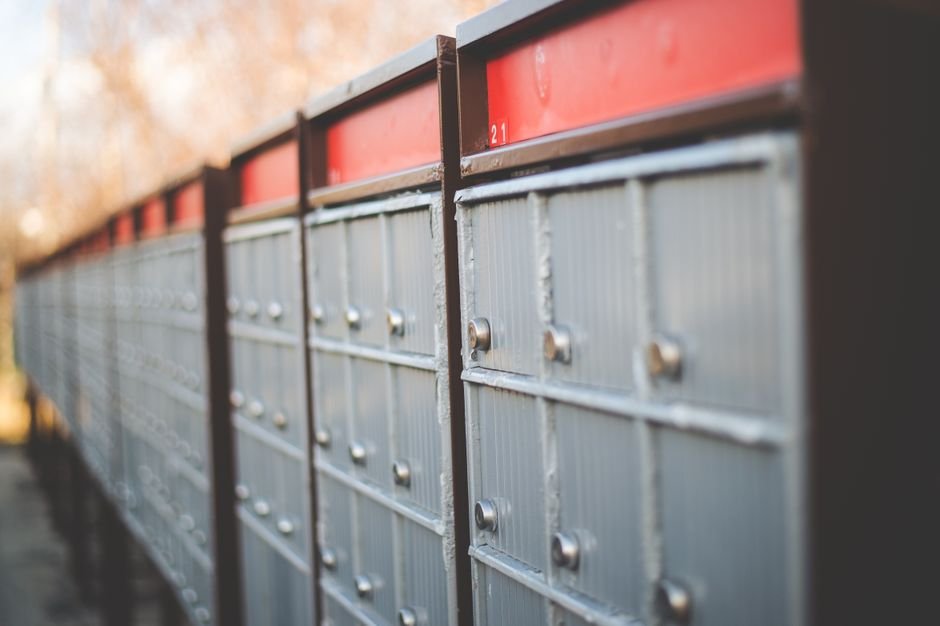 Row of PO box mail lockers, similar to boxes available at the Algona Iowa post office